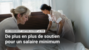 Deux femmes nettoyent une chambre d'hôtel